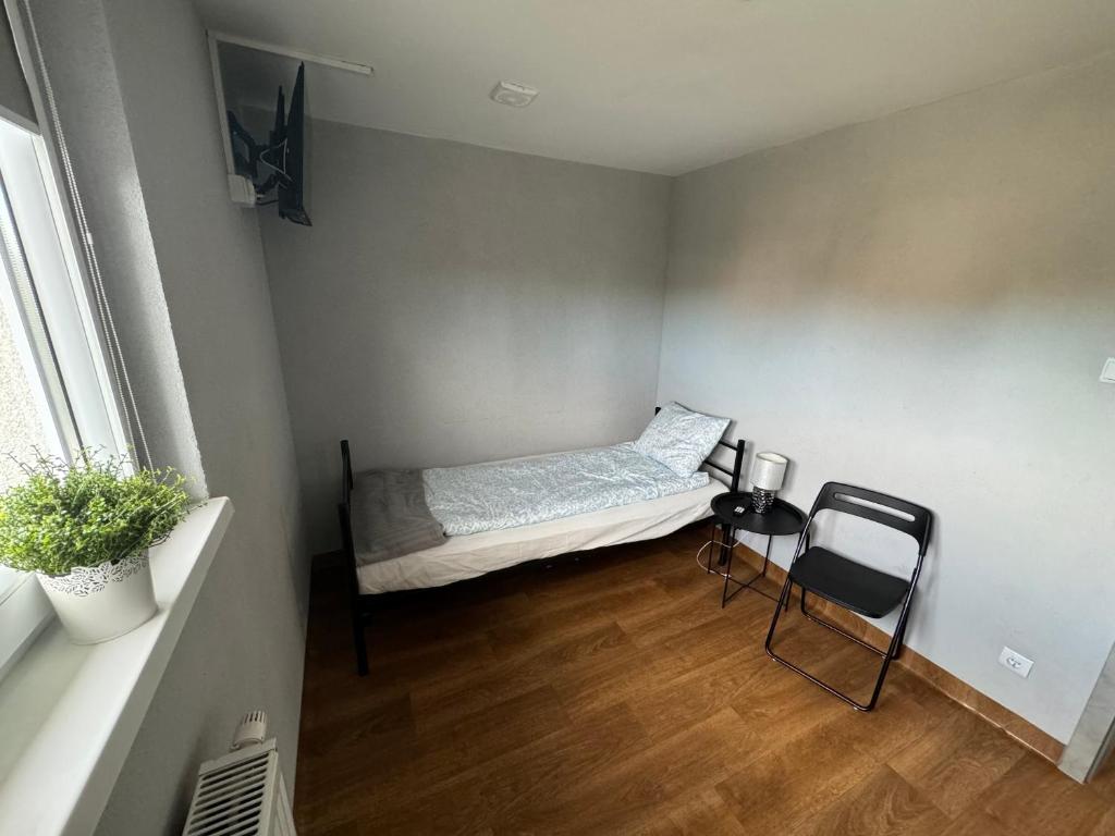 Postel nebo postele na pokoji v ubytování PGK Hostel Gryfino