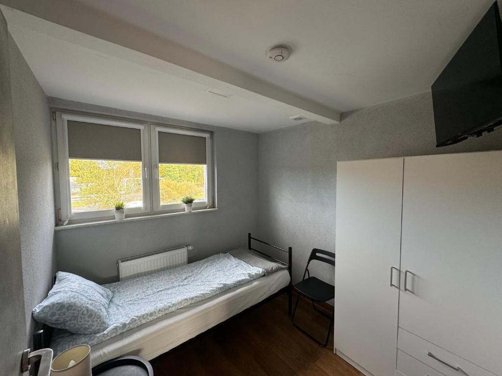 Postel nebo postele na pokoji v ubytování PGK Hostel Gryfino