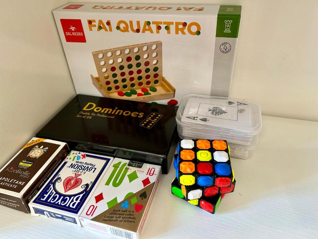 a box of dominoes and a box of games at Prospettiva Medina in Naples