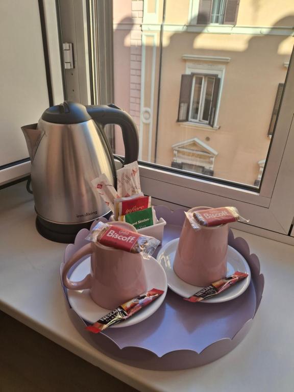 Příslušenství pro přípravu čaje a kávy v ubytování Hotel Castelfidardo