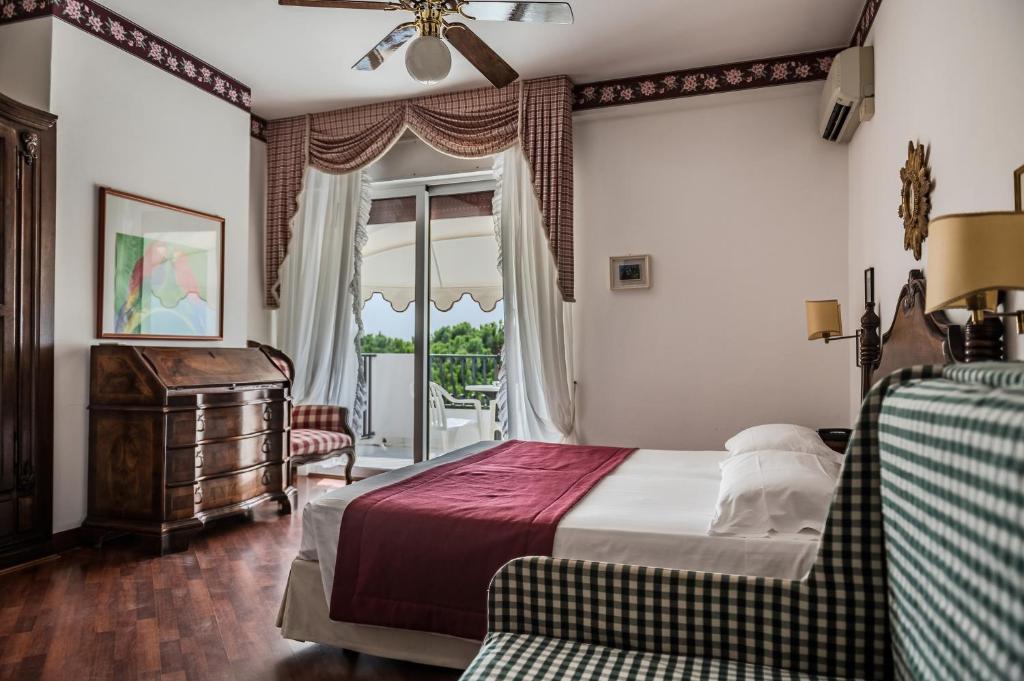 Postel nebo postele na pokoji v ubytování Agora Park Hotel