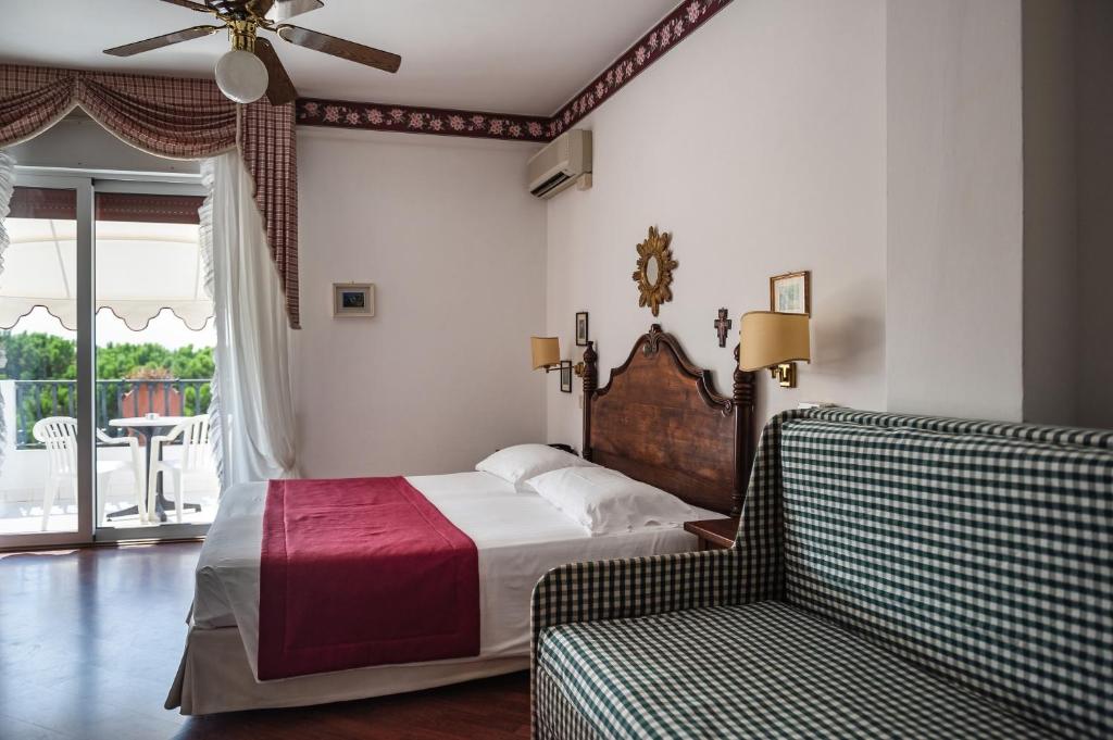 Postel nebo postele na pokoji v ubytování Agora Park Hotel