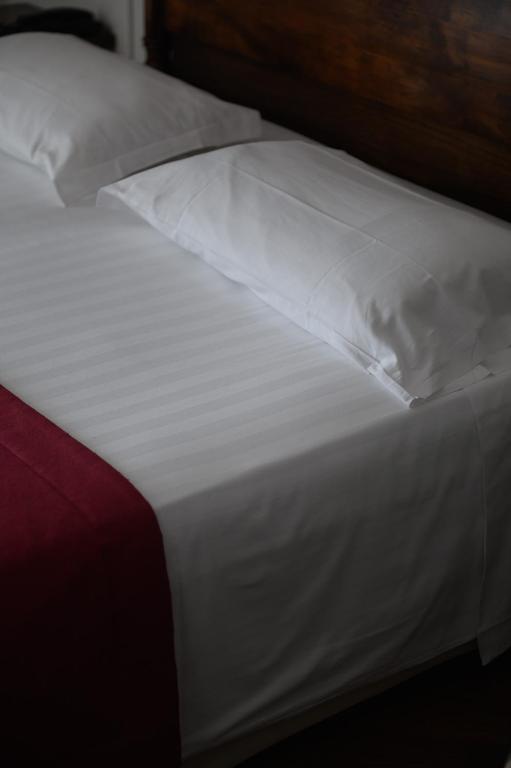 Postel nebo postele na pokoji v ubytování Agora Park Hotel