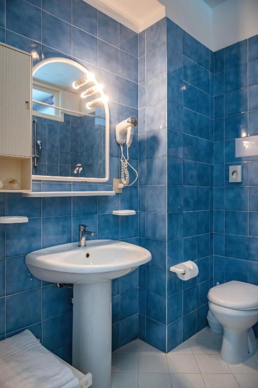 Koupelna v ubytování Agora Park Hotel