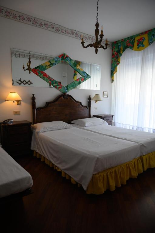 Postel nebo postele na pokoji v ubytování Agora Park Hotel