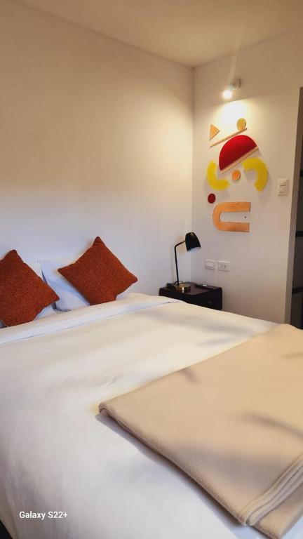 Postel nebo postele na pokoji v ubytování Solara Art House by Ämak