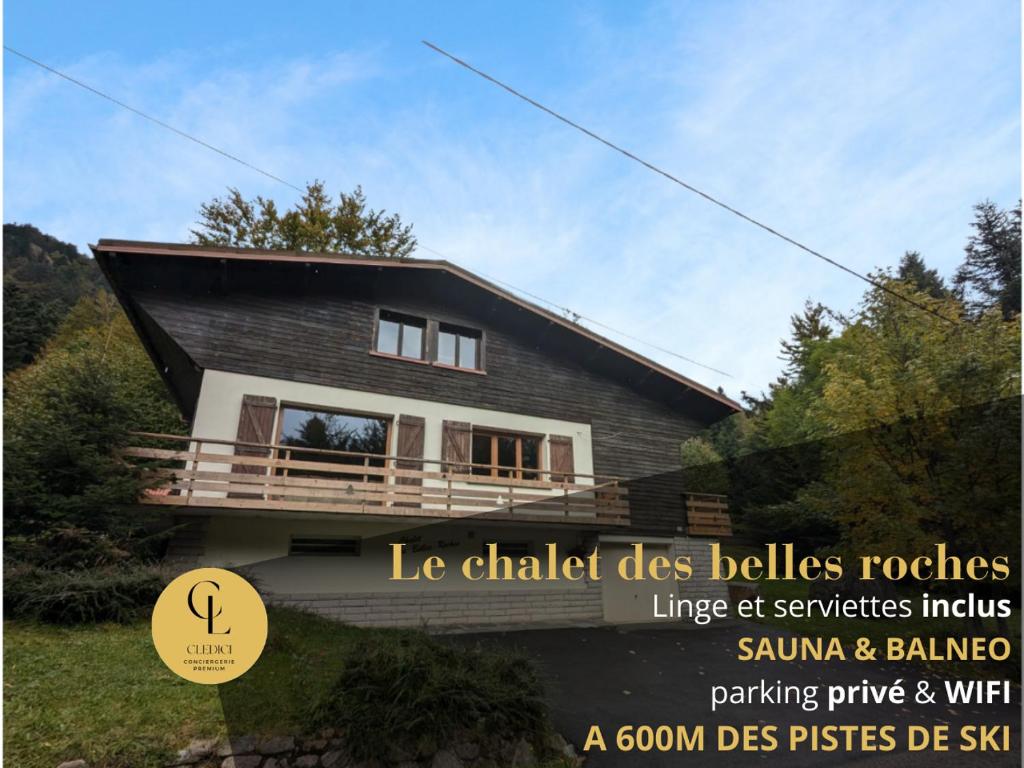 une maison avec un panneau indiquant la ligne des maisons du chlorure des bellezilles dans l'établissement Chalet des Belles Roches, 14 pers, garden, sauna, à La Bresse