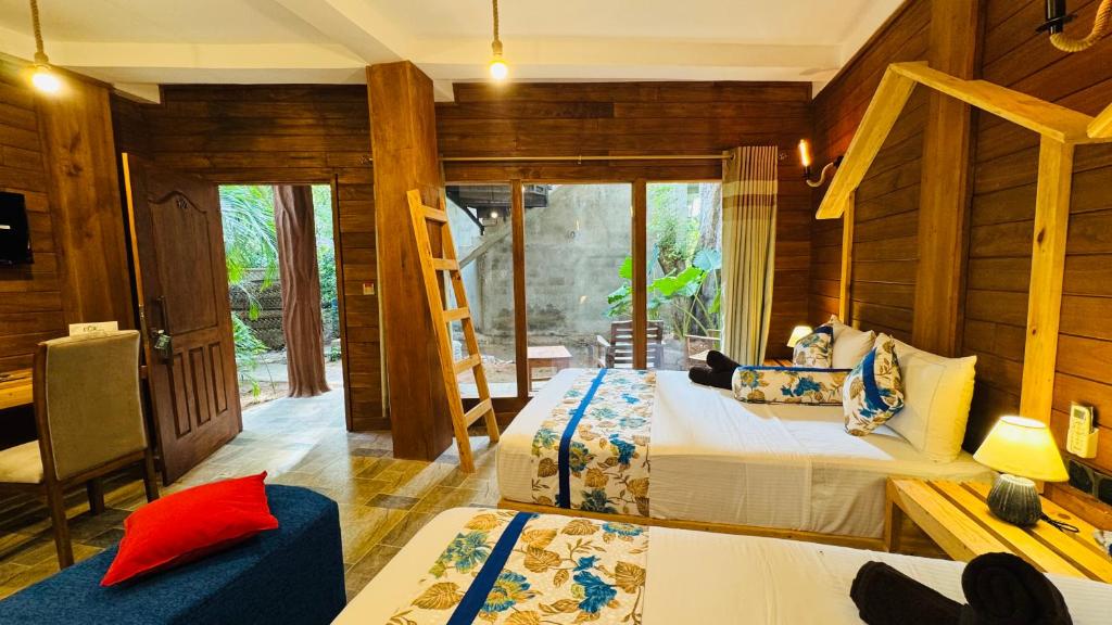 Fotografie z fotogalerie ubytování Palmyra Nature Resort Sigiriya v destinaci Sigiriya