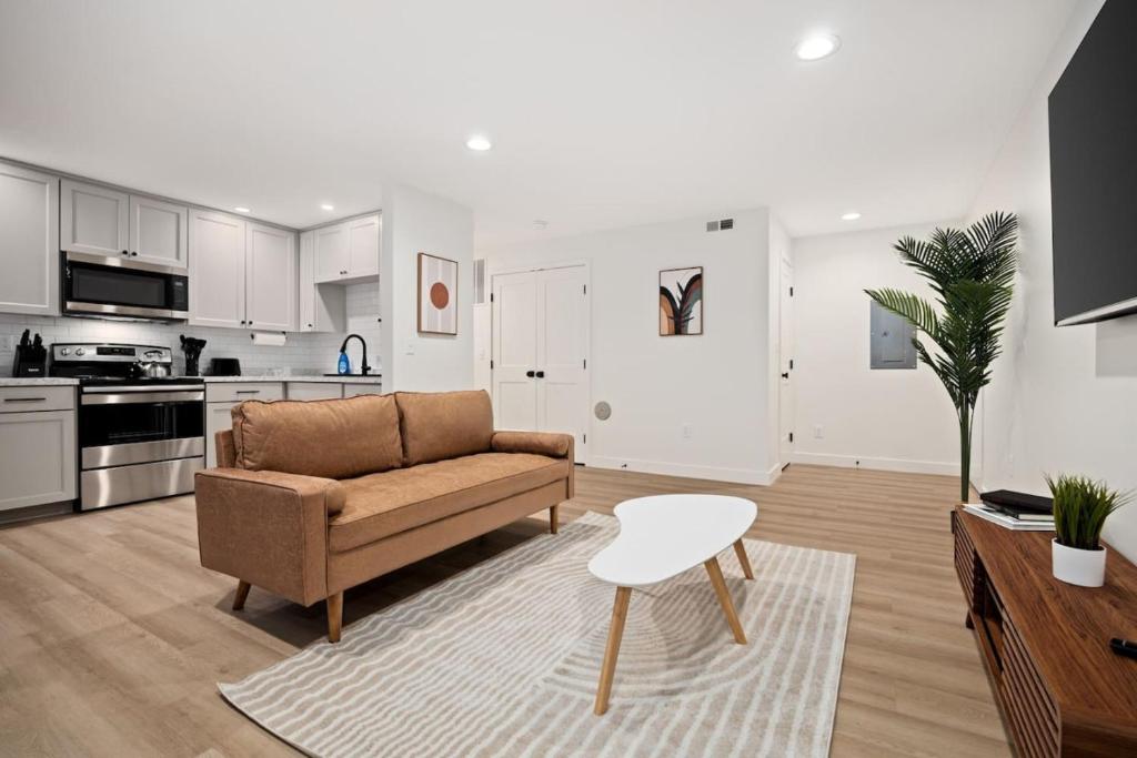 a living room with a couch and a table at The Silo 4 - 1BD Cozy Retreat in Morton