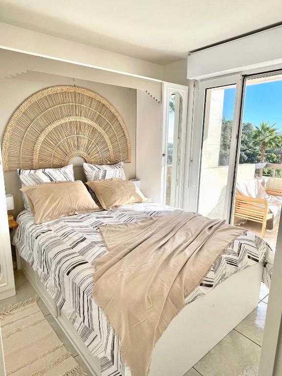 Ένα ή περισσότερα κρεβάτια σε δωμάτιο στο Appartement vue exceptionnelle