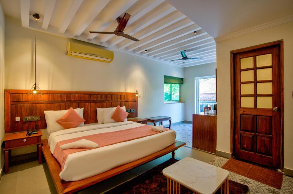 Postel nebo postele na pokoji v ubytování Dimaru Boutique Hotel
