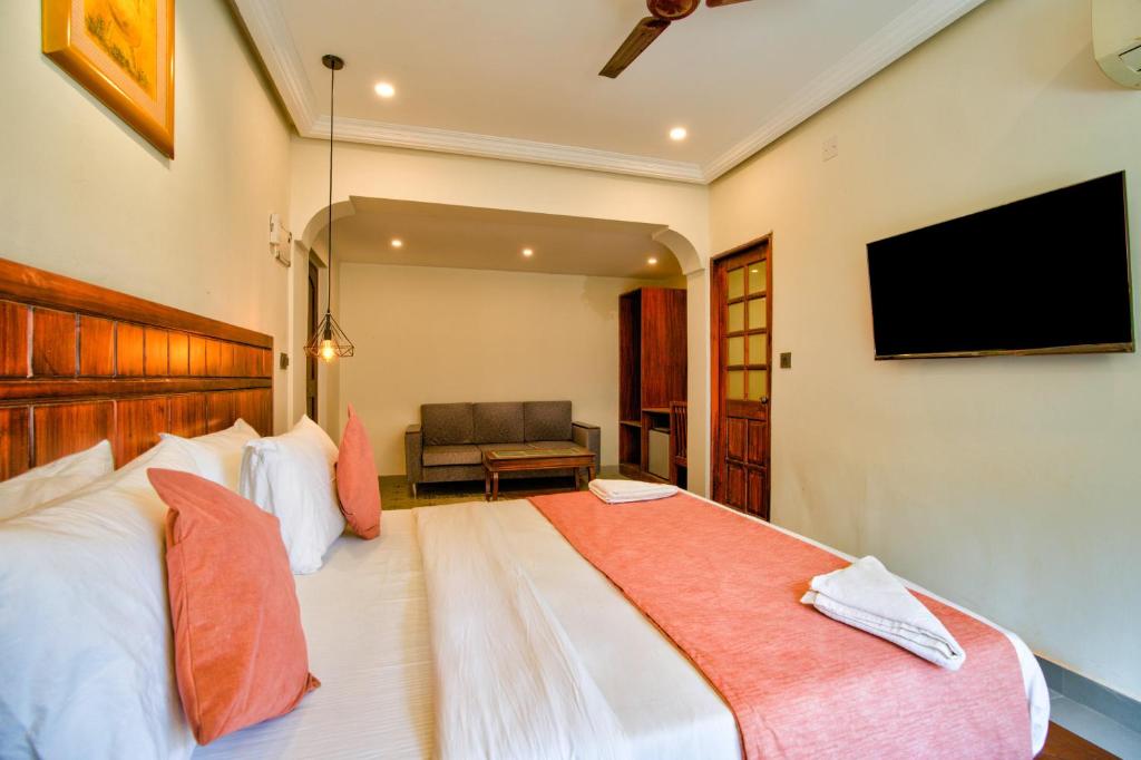 Postel nebo postele na pokoji v ubytování Dimaru Boutique Hotel