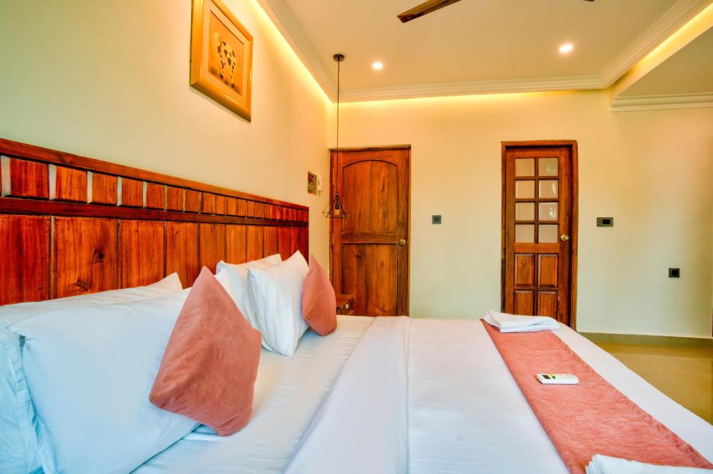 Postel nebo postele na pokoji v ubytování Dimaru Boutique Hotel