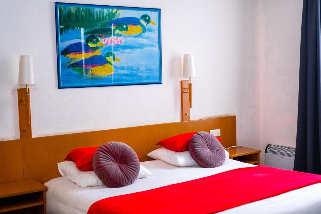Postel nebo postele na pokoji v ubytování Hotel Professor Leuven Centrum