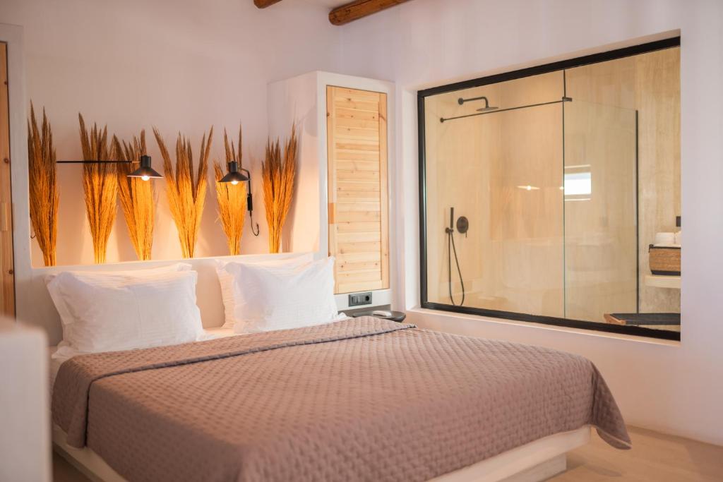 Ένα ή περισσότερα κρεβάτια σε δωμάτιο στο ARC suites