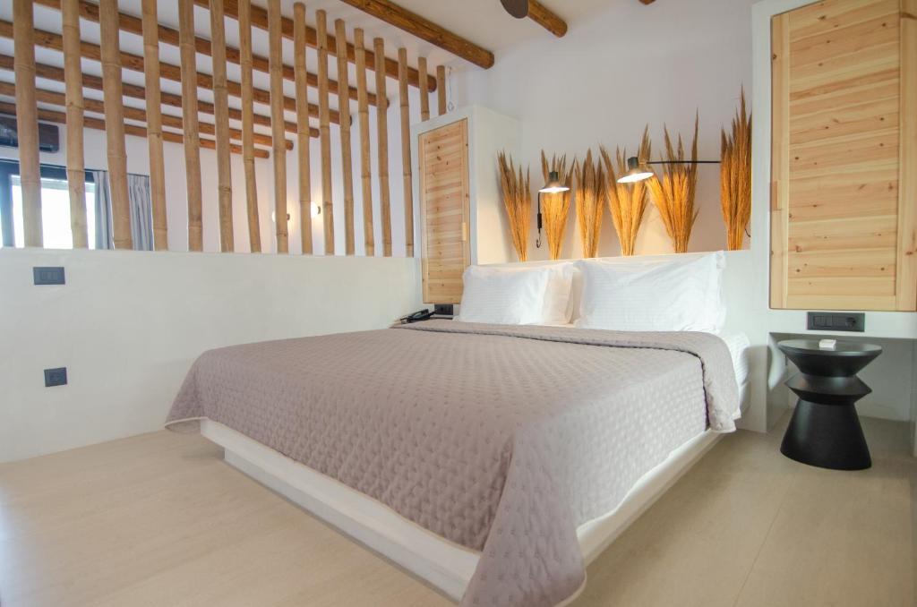 Ένα ή περισσότερα κρεβάτια σε δωμάτιο στο ARC suites