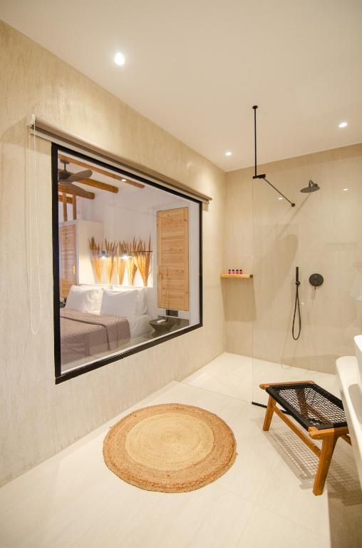 Ένα ή περισσότερα κρεβάτια σε δωμάτιο στο ARC suites