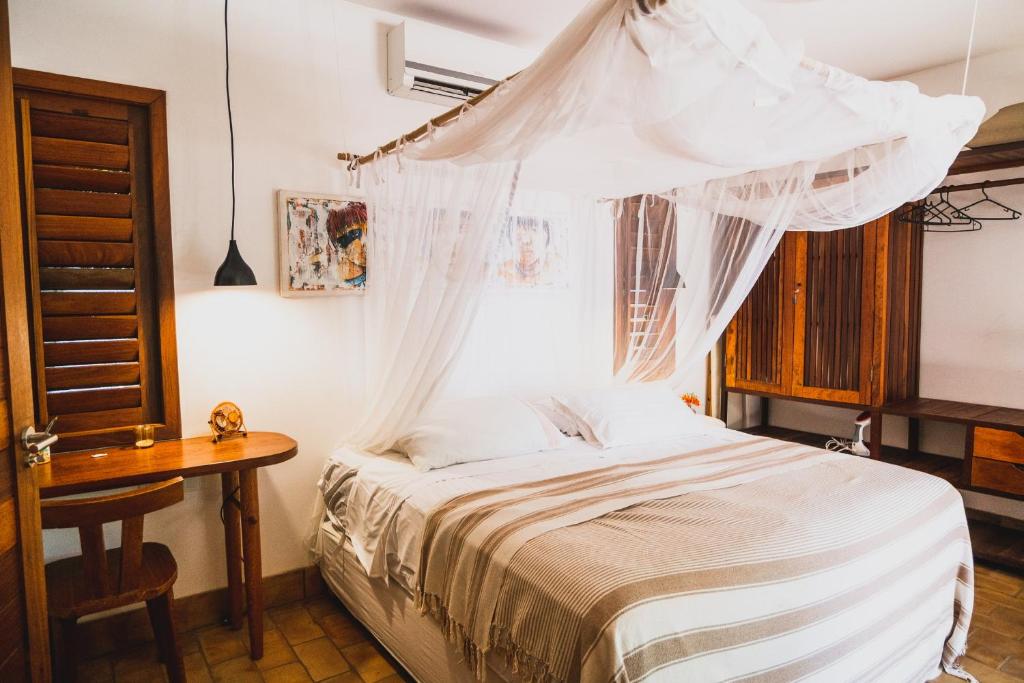 Postel nebo postele na pokoji v ubytování Baleias home
