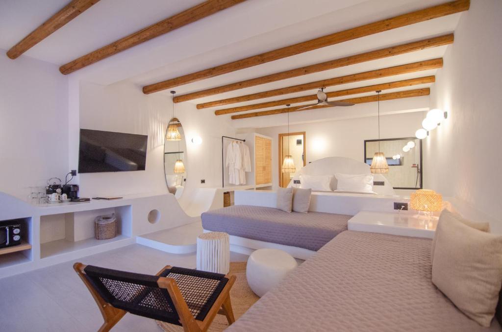 Ένα ή περισσότερα κρεβάτια σε δωμάτιο στο ARC suites
