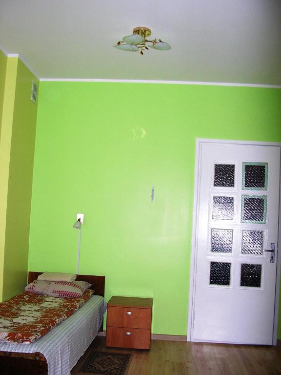 Postel nebo postele na pokoji v ubytování Kagu Hostel