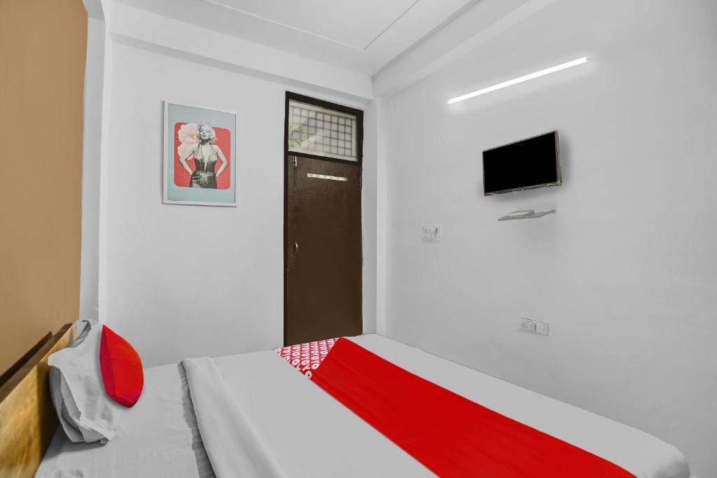 TV a/nebo společenská místnost v ubytování Super Hotel O Satguru Residency