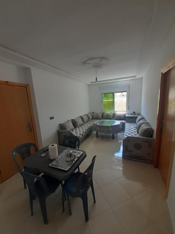 Posezení v ubytování Appartement à Martil 10 min de la plage