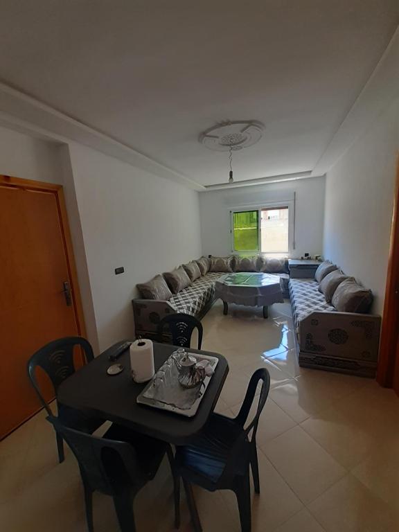 Posezení v ubytování Appartement à Martil 10 min de la plage