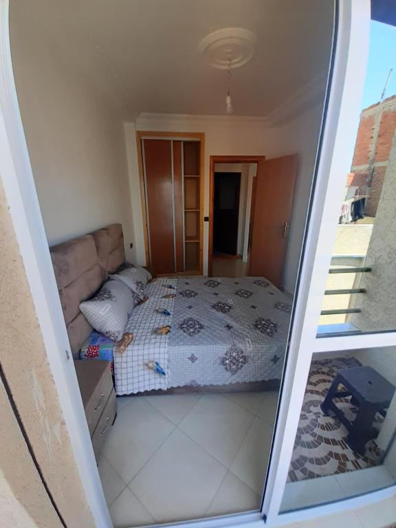 Postel nebo postele na pokoji v ubytování Appartement à Martil 10 min de la plage