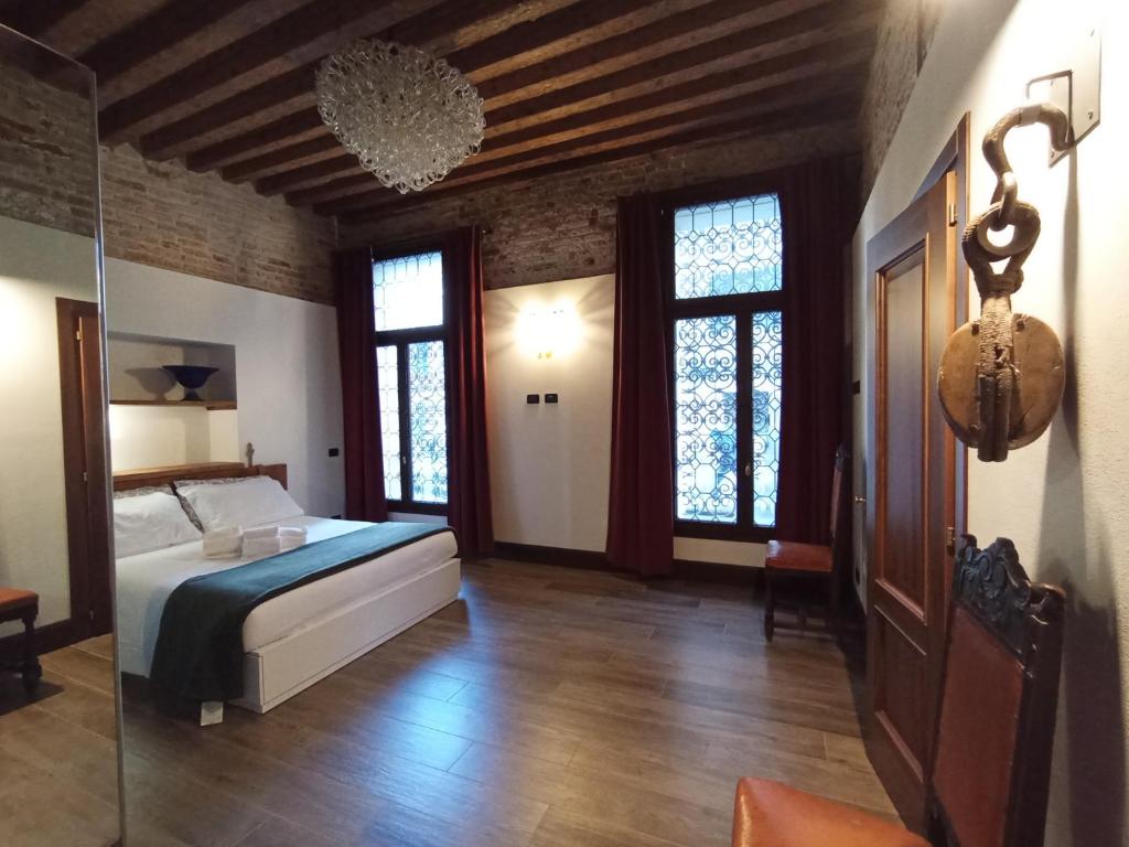 Posteľ alebo postele v izbe v ubytovaní Gradenigo Apartments 767