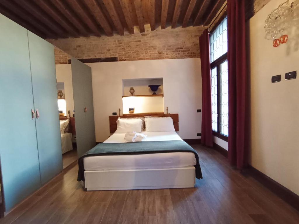 Posteľ alebo postele v izbe v ubytovaní Gradenigo Apartments 767