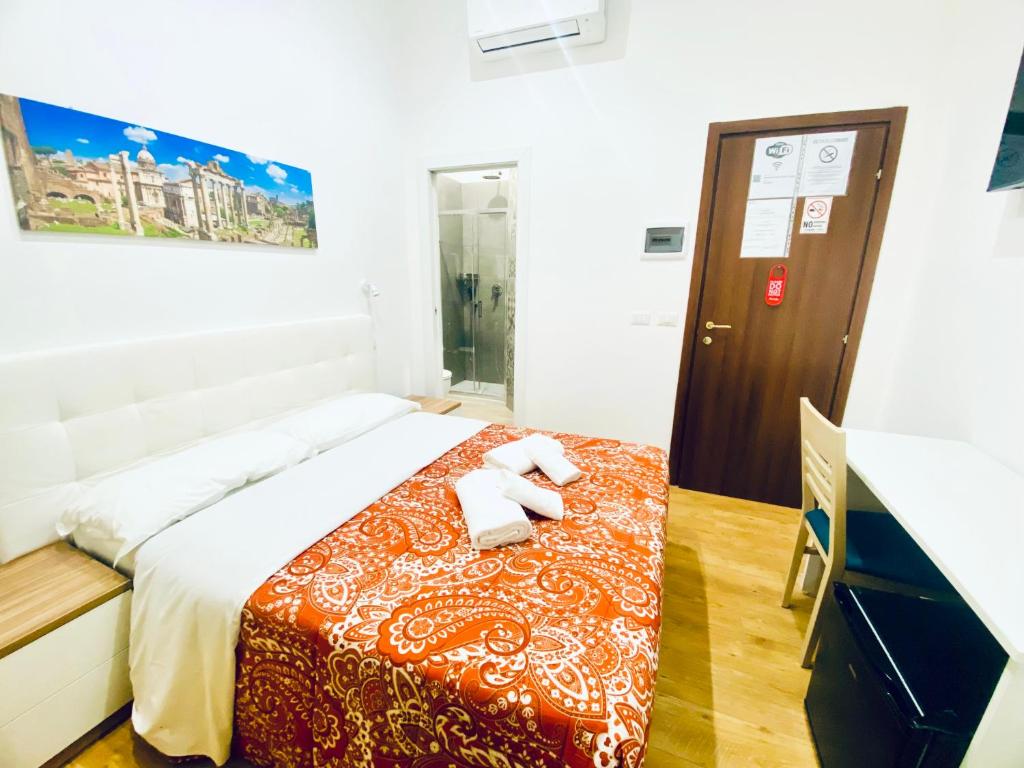 Łóżko lub łóżka w pokoju w obiekcie Tawhid Accomodation