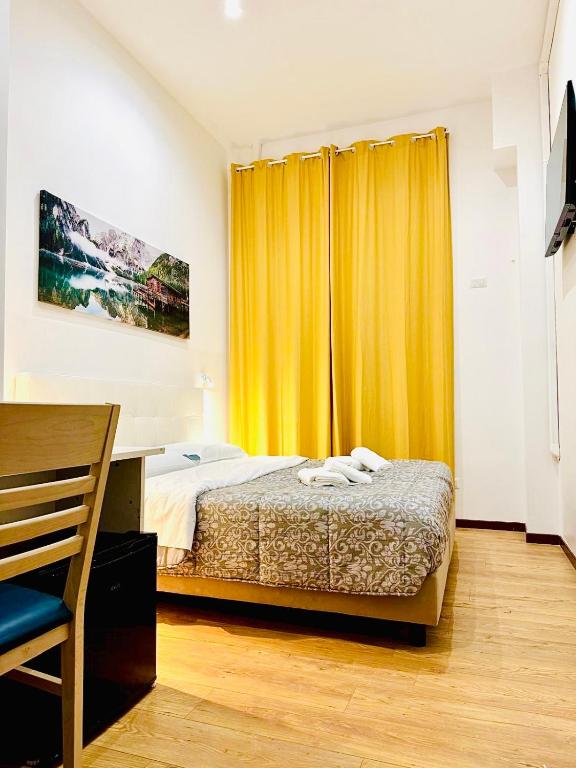 Łóżko lub łóżka w pokoju w obiekcie Tawhid Accomodation