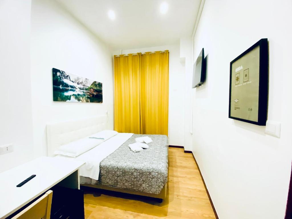 Łóżko lub łóżka w pokoju w obiekcie Tawhid Accomodation