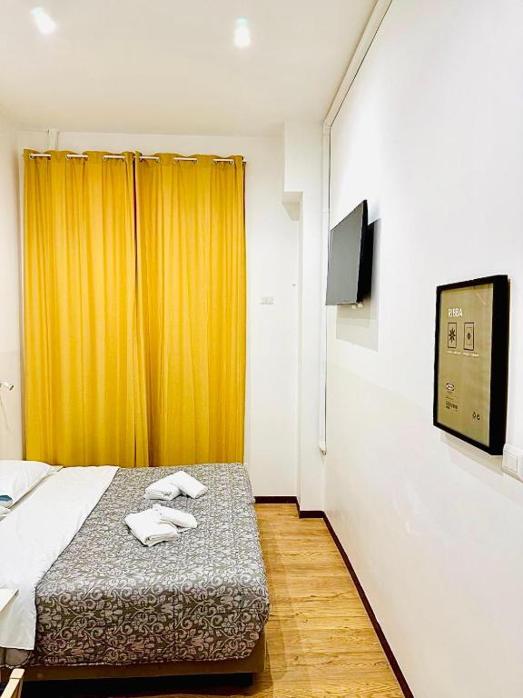 Łóżko lub łóżka w pokoju w obiekcie Tawhid Accomodation