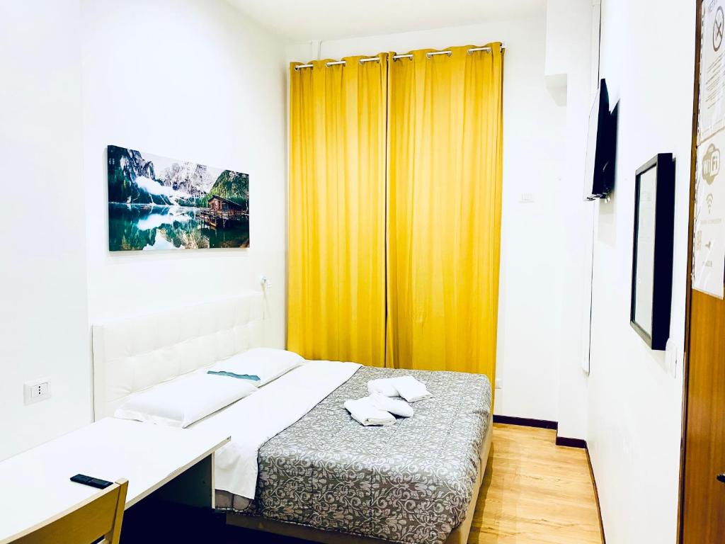 Łóżko lub łóżka w pokoju w obiekcie Tawhid Accomodation