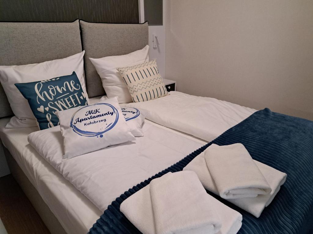 Posteľ alebo postele v izbe v ubytovaní MK Apartamenty Morski