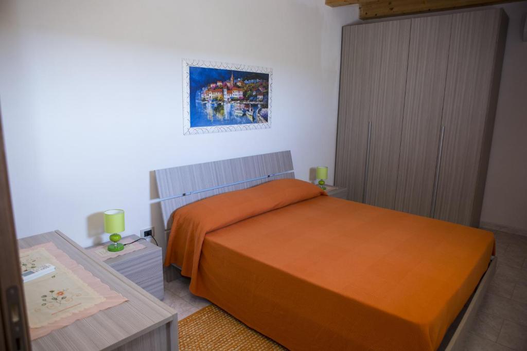Posteľ alebo postele v izbe v ubytovaní Casa Vacanze Calafarina