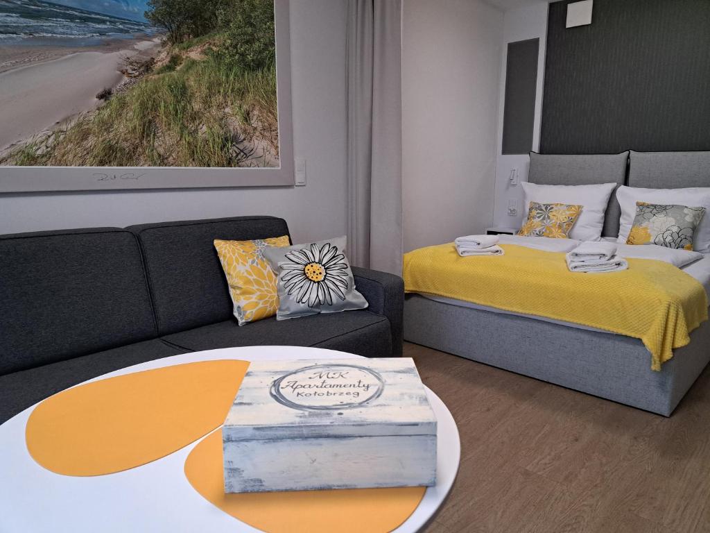 Posteľ alebo postele v izbe v ubytovaní MK Apartamenty Złocisty
