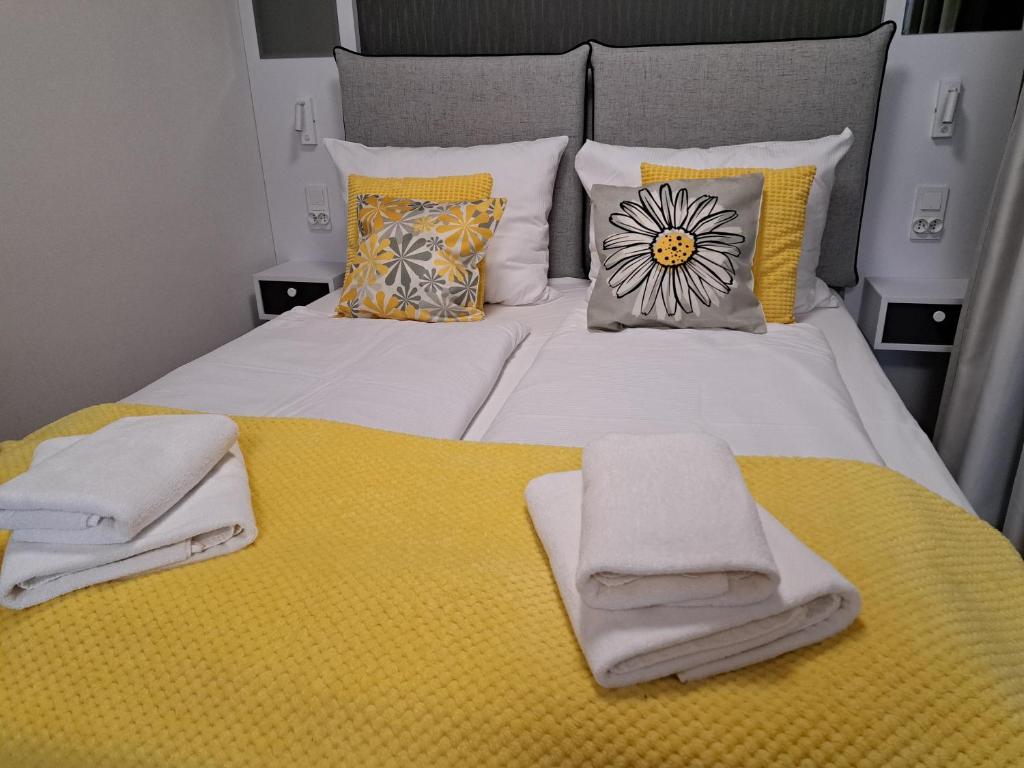 Posteľ alebo postele v izbe v ubytovaní MK Apartamenty Złocisty