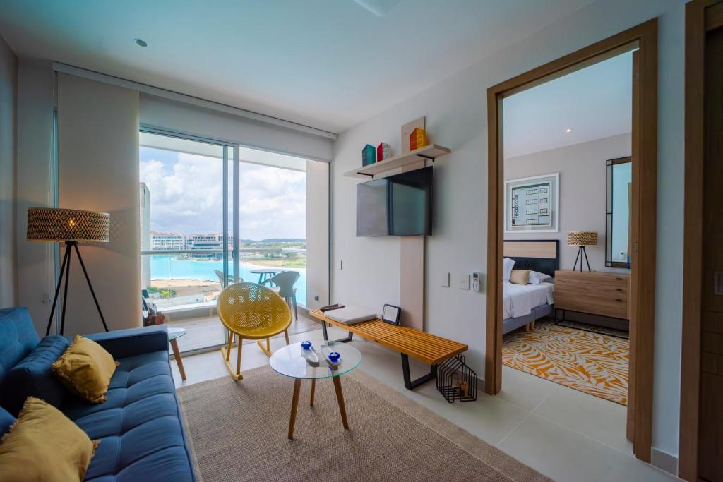 Μια τηλεόραση ή/και κέντρο ψυχαγωγίας στο Apartamento con laguna de aguas cristalinas