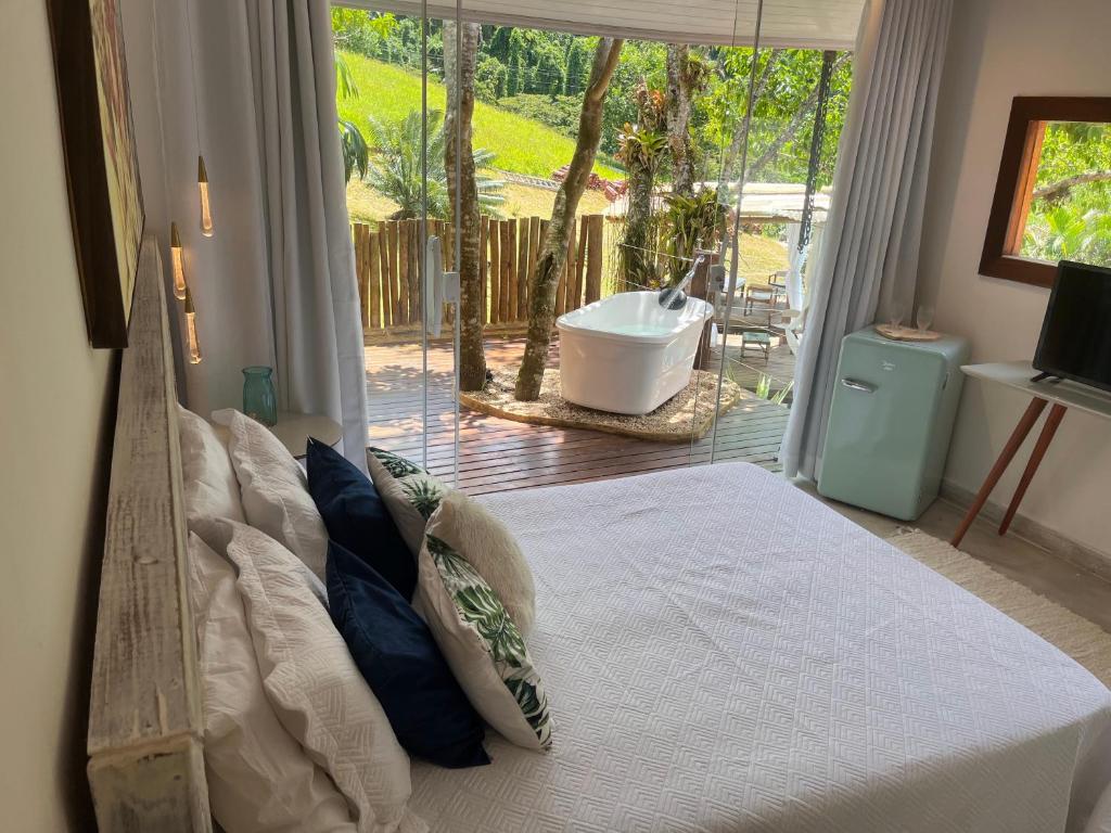 Cama ou camas em um quarto em Pousada Sonho Real