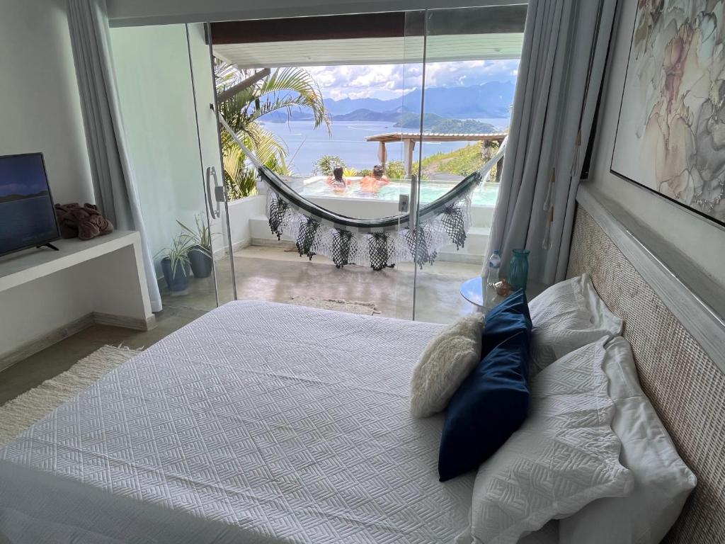 Cama ou camas em um quarto em Pousada Sonho Real