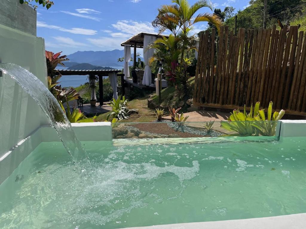 A piscina localizada em Pousada Sonho Real ou nos arredores