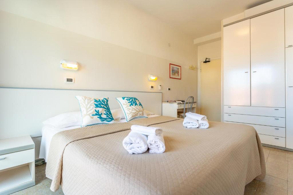 Postel nebo postele na pokoji v ubytování Hotel Selene - Vista Mare