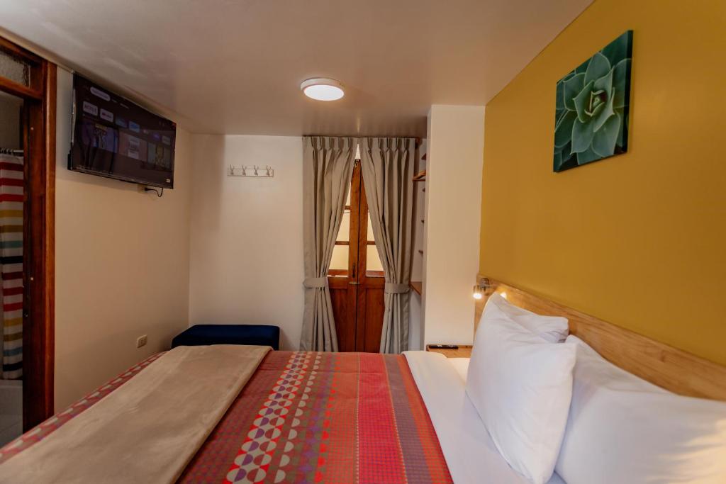 Postel nebo postele na pokoji v ubytování Kamma Guest House