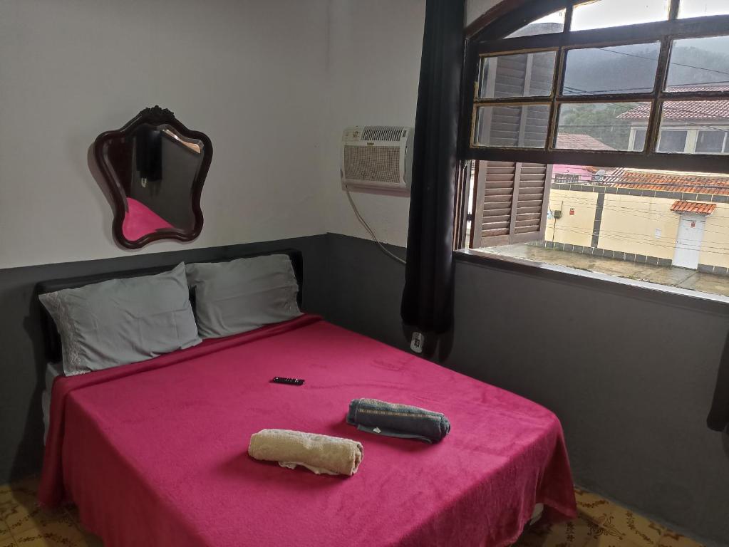 Ένα ή περισσότερα κρεβάτια σε δωμάτιο στο Refugio Piratininga 201