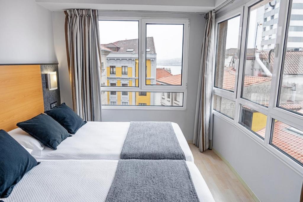Postel nebo postele na pokoji v ubytování Hotel Faranda Pathos Gijón, Ascend Hotel Collection