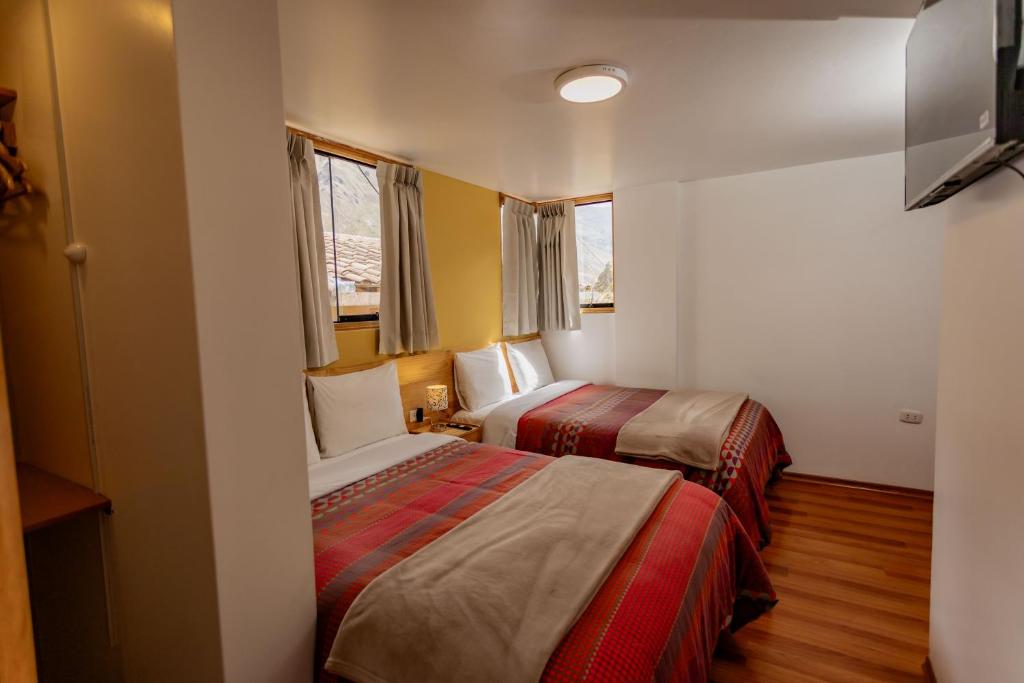 Postel nebo postele na pokoji v ubytování Kamma Guest House