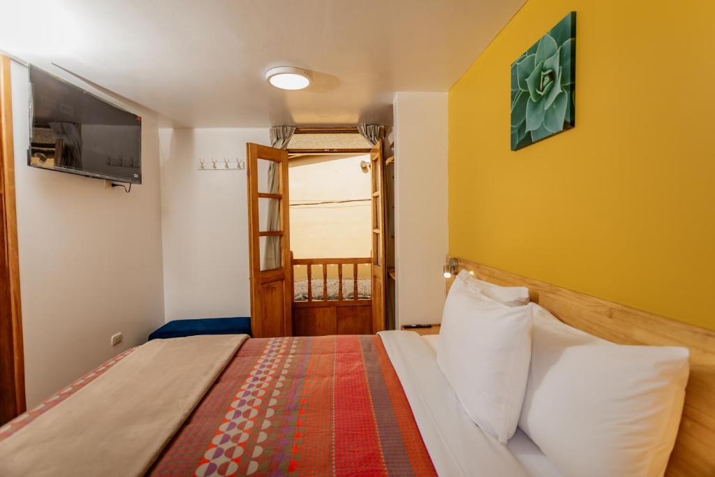 Postel nebo postele na pokoji v ubytování Kamma Guest House