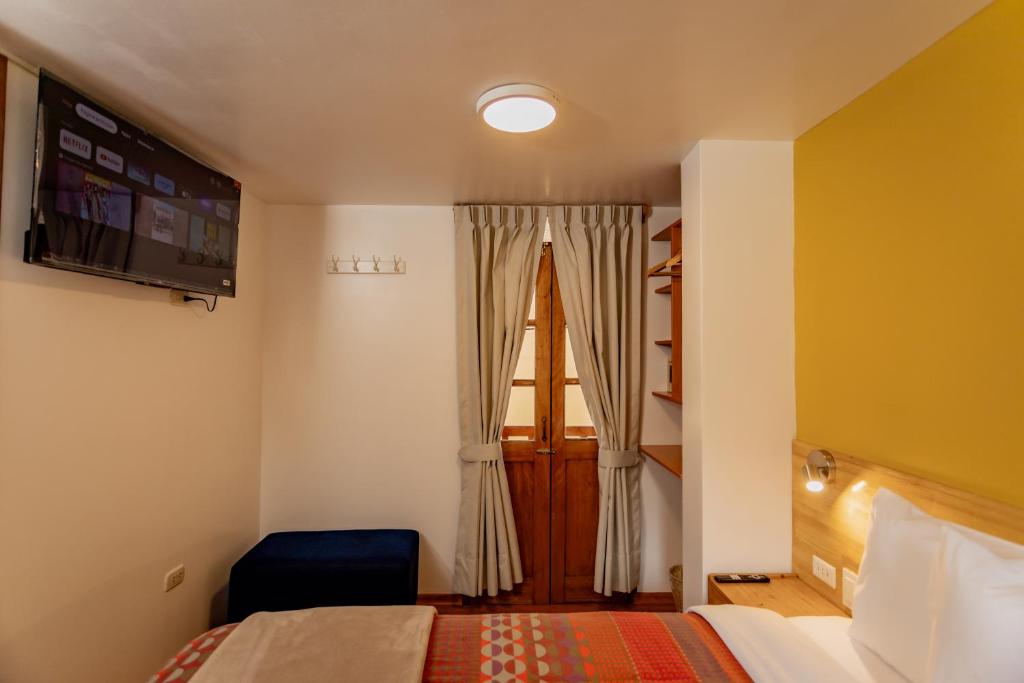 Postel nebo postele na pokoji v ubytování Kamma Guest House